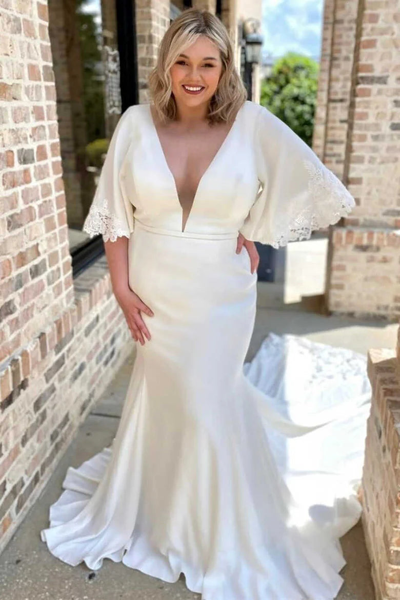 Vestido de novia largo estilo sirena con escote en V y mangas abullonadas y cola larga